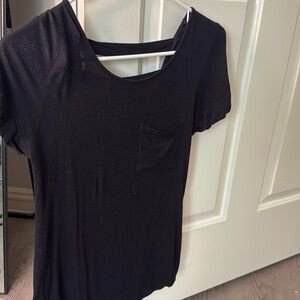 Zenana Outfitters. Size Small. Back top with pocket, open back, buttons sleeve.